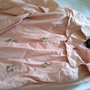 Pink trench coat